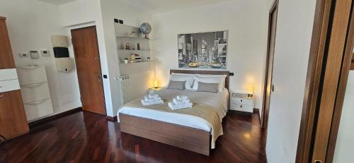 DG Apartment Busto 객실 침대