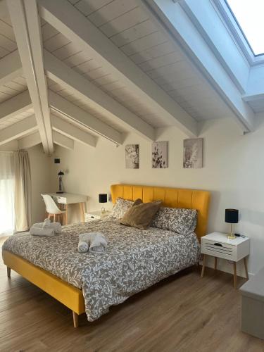 a bedroom with a large bed in a room at b&b Civico 30 in Lonato