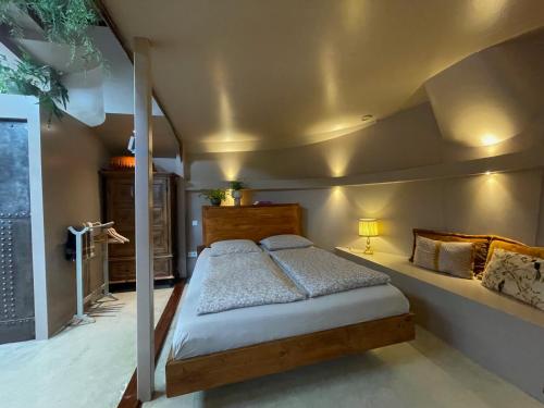 a bedroom with a bed in a room at Houseboat Tante Piet in Amsterdam