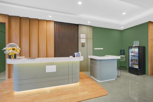 a lobby with a counter in a store at Hotel O Ciapus Bogor in Bogor