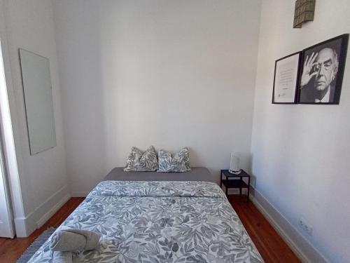 a bedroom with a bed in a room at Embassy Arriaga Private Elegance Rooms in Stylish Shared Apartment in Lisbon