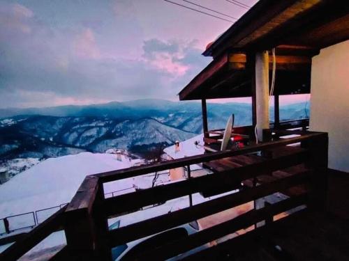 a balcony of a house with a view of a mountain at Paradise - Guest House in Beden