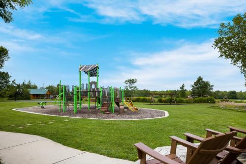 a playground with a slide in a park at HTR Niagara in Grand Island