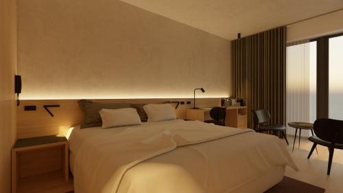 Krevet ili kreveti u jedinici u objektu KG Hotel