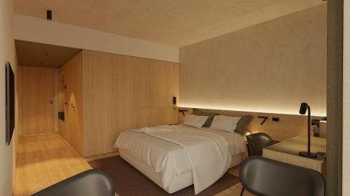 Krevet ili kreveti u jedinici u objektu KG Hotel