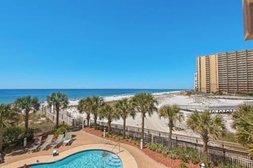 a view of a resort with a swimming pool and the beach at Destin Towers 32 in Destin