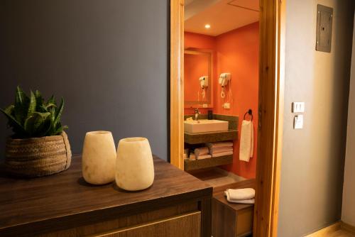 a bathroom with a sink and a mirror at Al Dora Hotel & Spa in Hurghada