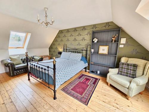 a bedroom with a bed and a chair at The Byre - by Where Stags Roar in Newtonmore