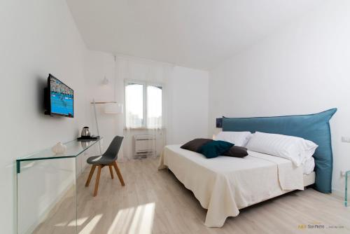 Ένα ή περισσότερα κρεβάτια σε δωμάτιο στο B&B San Pietro