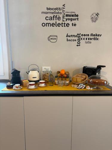 a kitchen counter with food on top of it at B&B Le Saline Bed & Breakfast in Cervia
