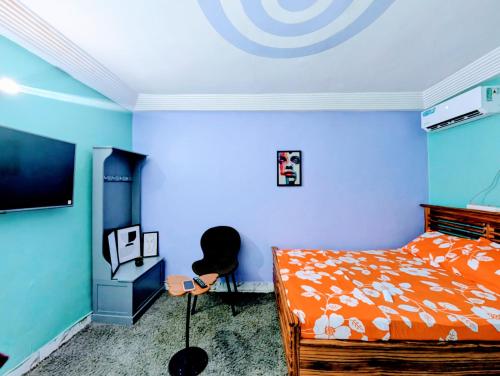 เตียงในห้องที่ Jamari Rooms
