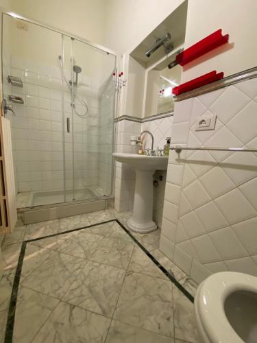 a bathroom with a shower and a sink at la casa d'oro in Arezzo