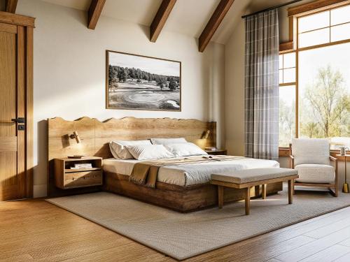 a bedroom with a large bed and a chair at Tributer Resort in Mineral