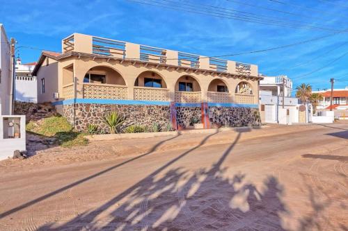 a building on the side of a street at Spacious Oceanview Home Casa de Los Amigos in Puerto Peñasco