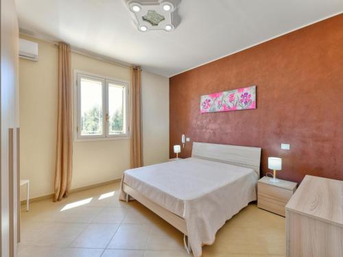 a bedroom with a large bed in a room at Villa with private pool in Floridia in Floridia