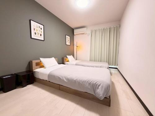 Auberge Craft房間的床