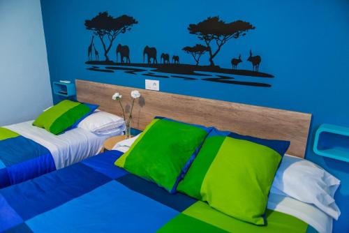 Posteľ alebo postele v izbe v ubytovaní Hostal La Pastora
