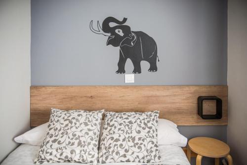 Ένα ή περισσότερα κρεβάτια σε δωμάτιο στο Hostal La Pastora