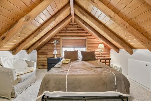 a bedroom with a large bed in a attic at Forest Hideaway Near Sedona in Munds Park