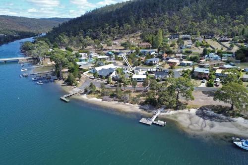 an aerial view of a small island in the water at Orford Waterfront Cottage in Orford