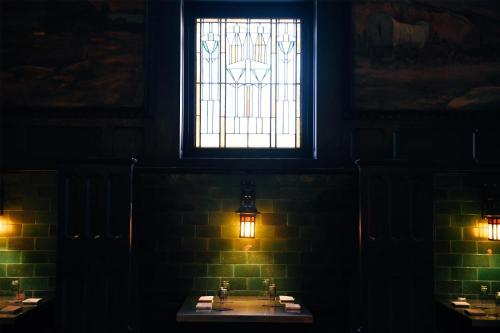 a bathroom with a sink and a window at Hotel Savoy Kansas City, Tapestry Collection by Hilton in Kansas City