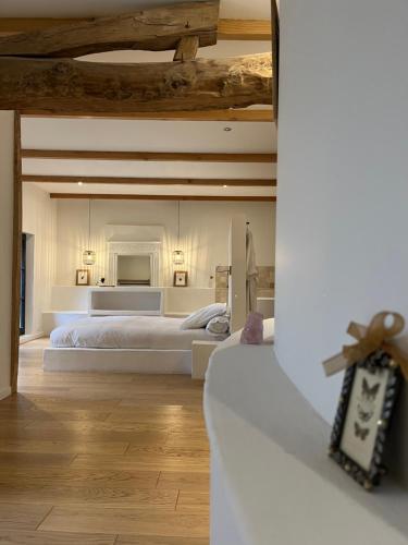 Postel nebo postele na pokoji v ubytování Malis Castera Le Petit Château
