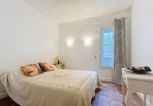 Llit o llits en una habitació de Chez Tania
