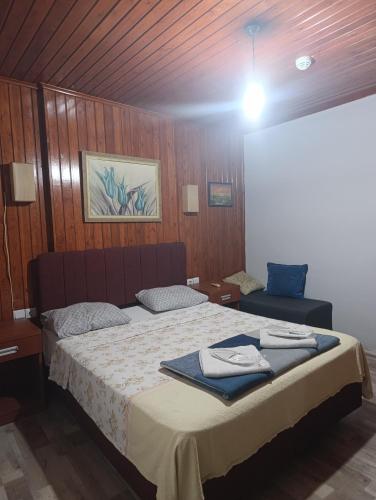 Llit o llits en una habitació de Camel Apartment