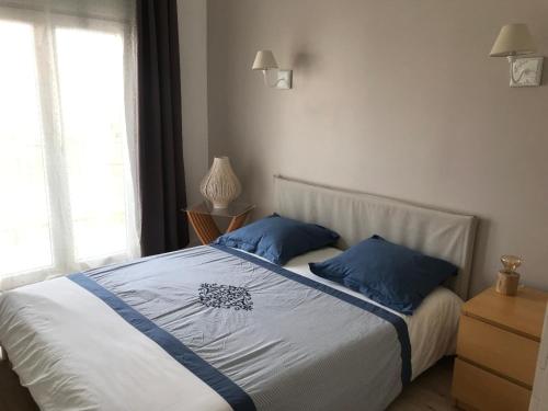 Appartement 42 m2 avec parking dans jardin