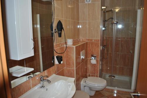 Et badeværelse på Apartments - Turistična kmetija Vrbnjak