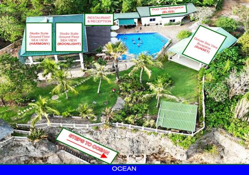 an aerial view of a resort with a swimming pool at Casa Feliz Ocean Resort in Siquijor