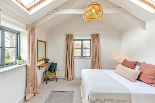 a bedroom with a bed and a chandelier at 3 Bed in Hayle oc-78551 in Hayle