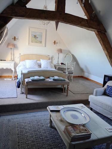 Llit o llits en una habitació de Le Presbytere