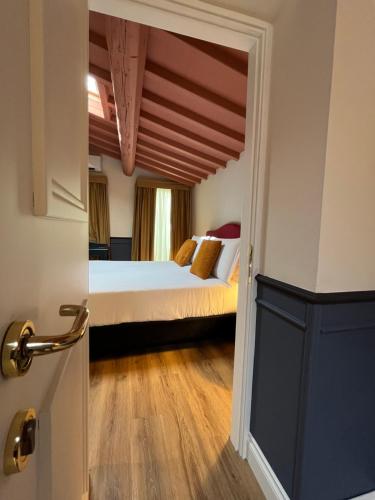 a bedroom with a bed in a room at JOIVY Together Florence Secret Nest in Florence