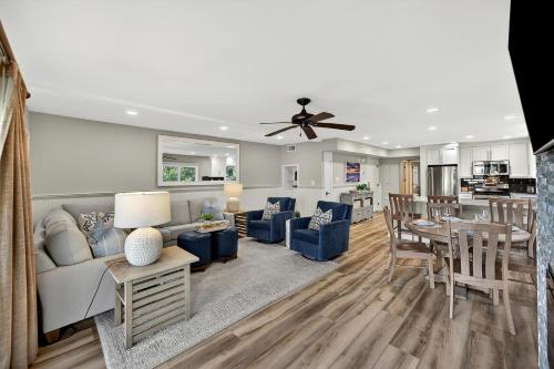 a living room with a couch and a table at SG8A: 8A Seagrove Villa in Isle of Palms