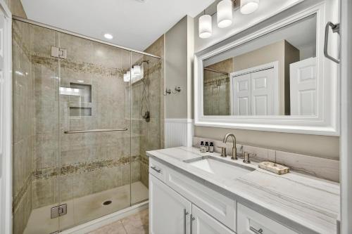 a bathroom with a sink and a shower at SG8A: 8A Seagrove Villa in Isle of Palms