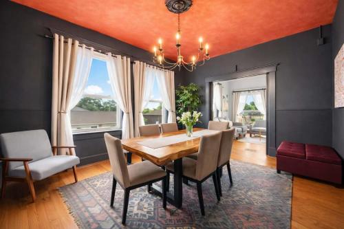 a dining room with a table and chairs at Riverview Escape in Walkable Historic District in Jeffersonville