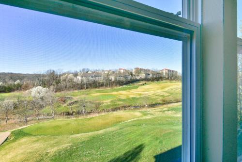 a window with a view of a golf course at Gorgeous Condos at Thousand Hills - Heart of Branson - Spacious and Affordable in Branson