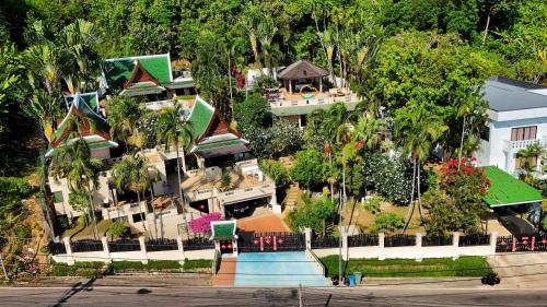 an aerial view of a house with a garden at D Villa Phuket - Luxury 6 Bedroom Private Pool Villa in Cape Panwa in Phuket