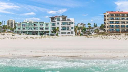 a view of the beach in front of condos at The Pearl in Clearwater Beach