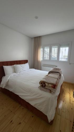 Кровать или кровати в номере Apartment 030