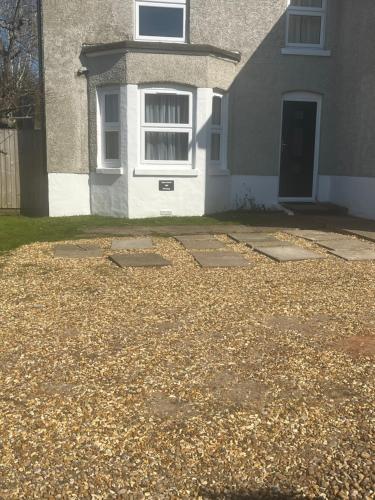 a house with a lot of leaves in front of it at Apartment 288 in Lower Swanwick