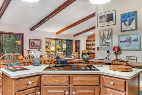 a kitchen with a center island in a room at Loonsight in Minocqua