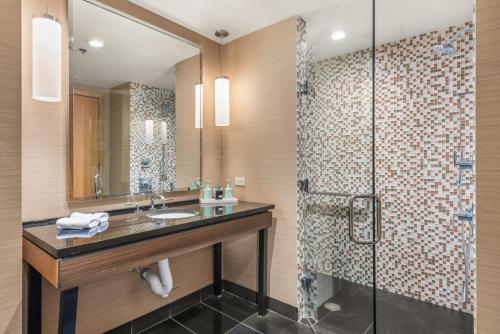 a bathroom with a sink and a shower at Ski-In Ski-Out Resort Studio Steps from Slopes in Snowmass Village