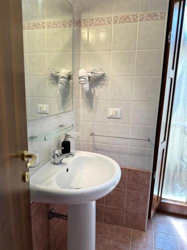 a bathroom with a sink and a mirror at Locanda Del Castello Bed an Breakfast in San Panfilo dʼOcre