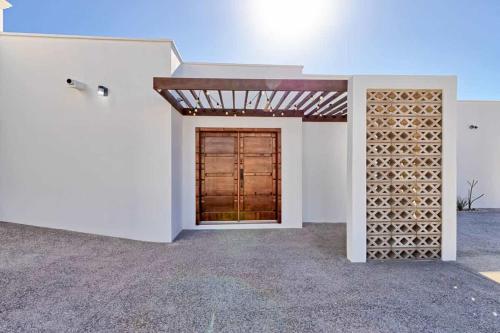 an empty room with a door in a house at Luxury & Spacious Beachfront Home Casa Espiritu in Puerto Peñasco