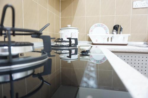 Φωτογραφία από το άλμπουμ του Warisan Indah Homestay KLIA 1 Melayu sahaja σε Σεπάνγκ