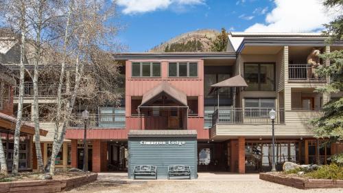 an exterior view of the chandon lodge building at Cimarron Lodge 50 by AvantStay Ski-InSki-Out Property in Complex w Two Hot Tubs in Telluride