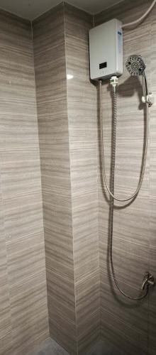a shower in a bathroom with a shower at Melinda Place in Camarin