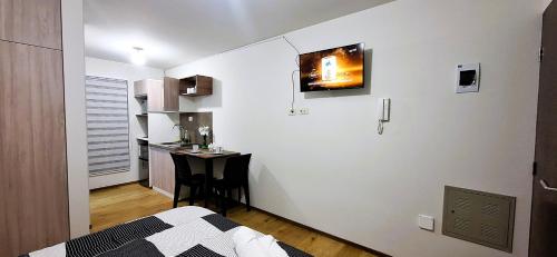 Llit o llits en una habitació de Mini Studio en El Prado
